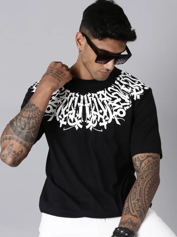 Trendy oversized grey t-shirt featuring a bold back print “IDENTITY”